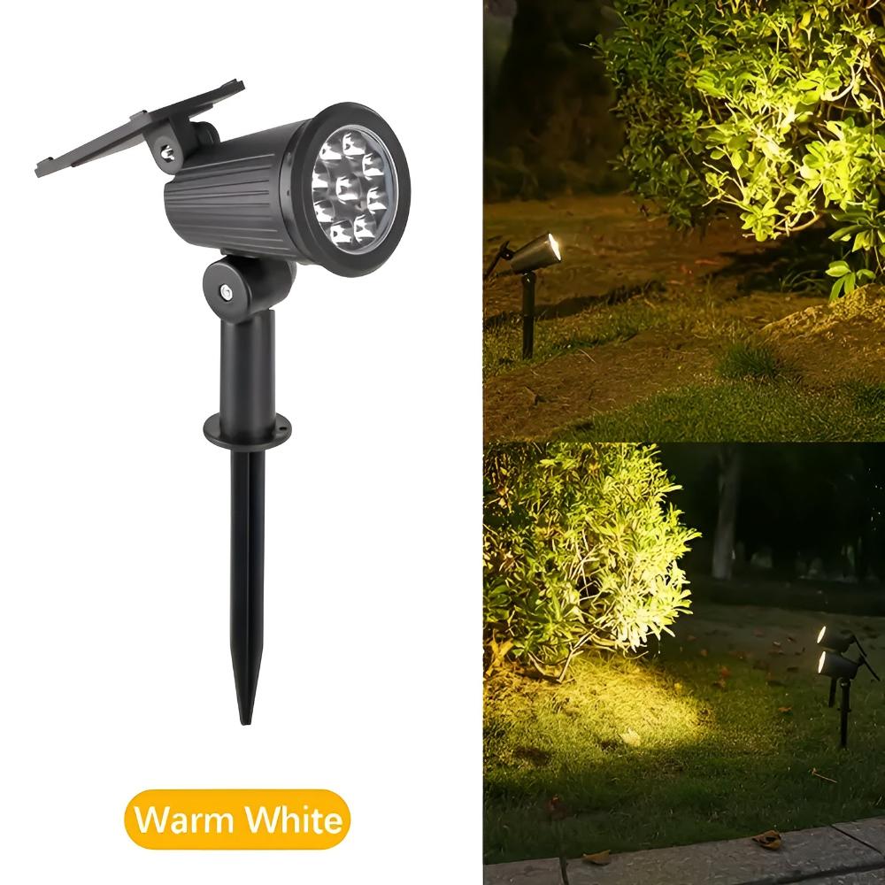 Solcellelampe med 9 LED lyser op i en have om aftenen