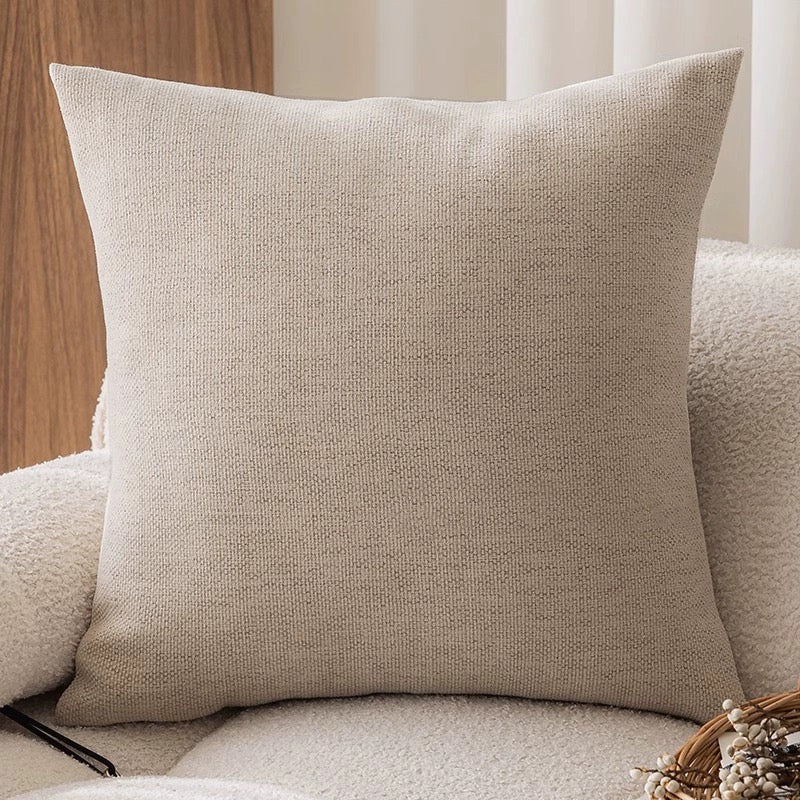 Pudebetræk i fransk vintagestil med vævet jacquardmønster på sofaen