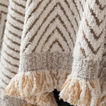 Skridsikkert sofabetræk i mikrofiber med sildebensmønster på sofa