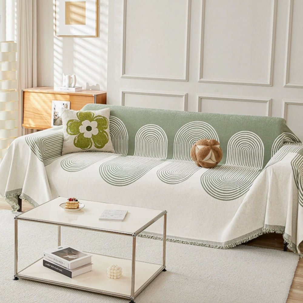 Dobbeltsidet chenille sofabetræk i boho-stil på en stue-sofa