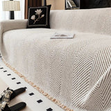 Skridsikkert sofabetræk i mikrofiber med sildebensmønster på sofa