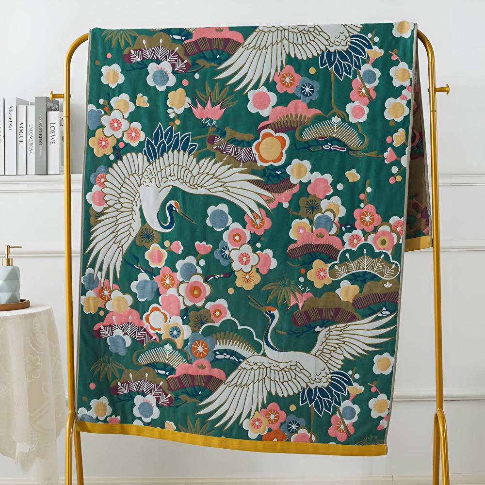 Badehåndklæde i bomuld med blomster og traner