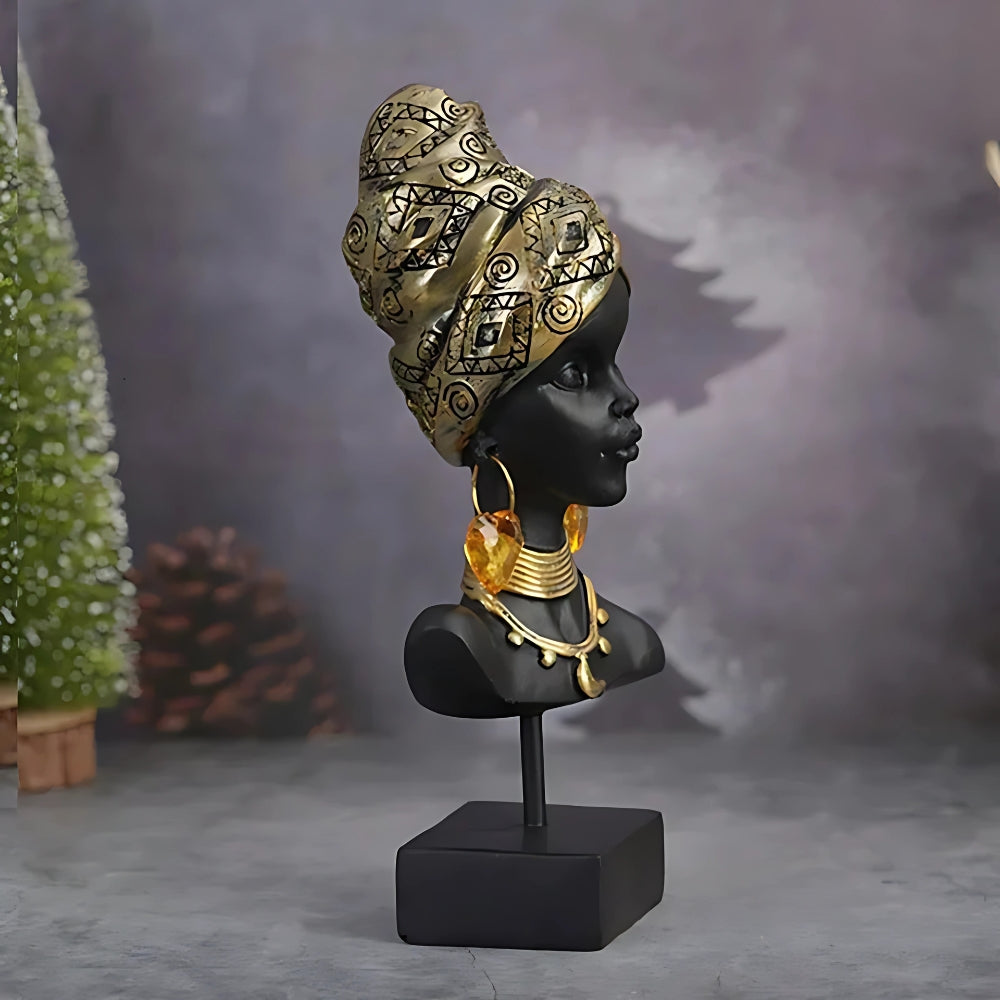Elegant smykkeskål i resin med sort kvindefigur på kommode