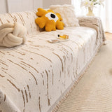 Sofabetræk i microfiber med geometrisk jacquard og kvaster på sofa
