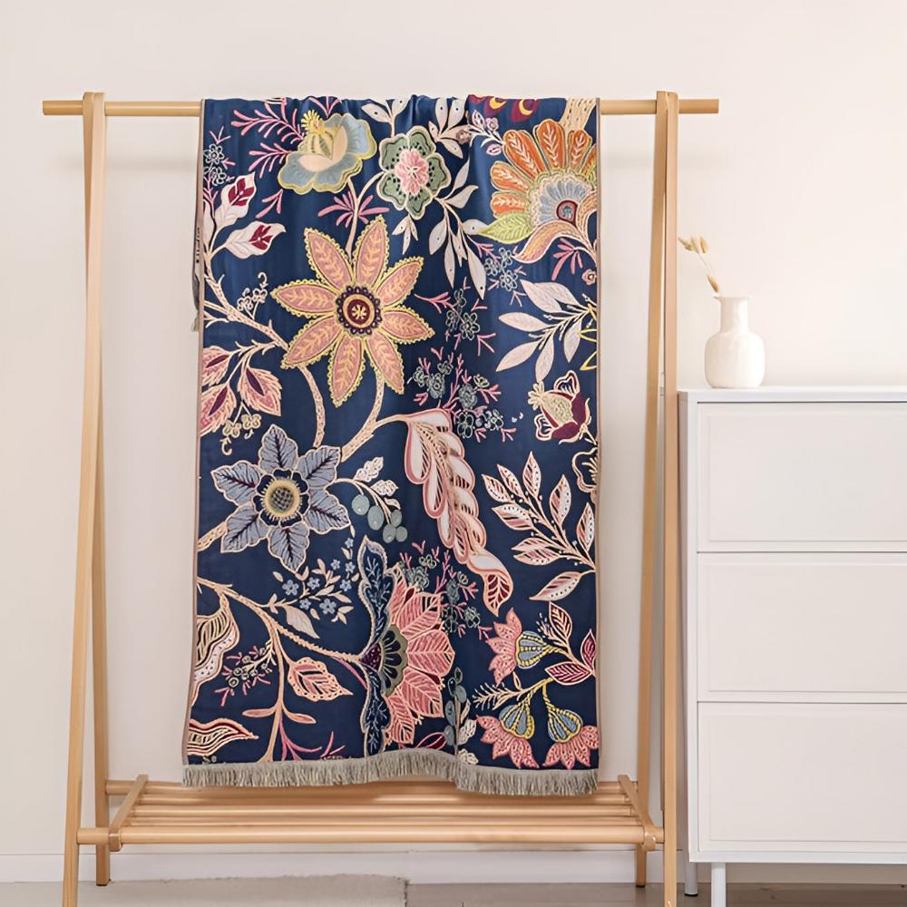 Vendbart badehåndklæde i ren bomuld med blomsterprint