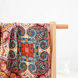 Stort badehåndklæde i bomuld med farverigt vintage boho-mønster