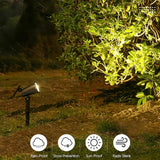 Solcellelampe med 9 LED lyser op i en have om aftenen