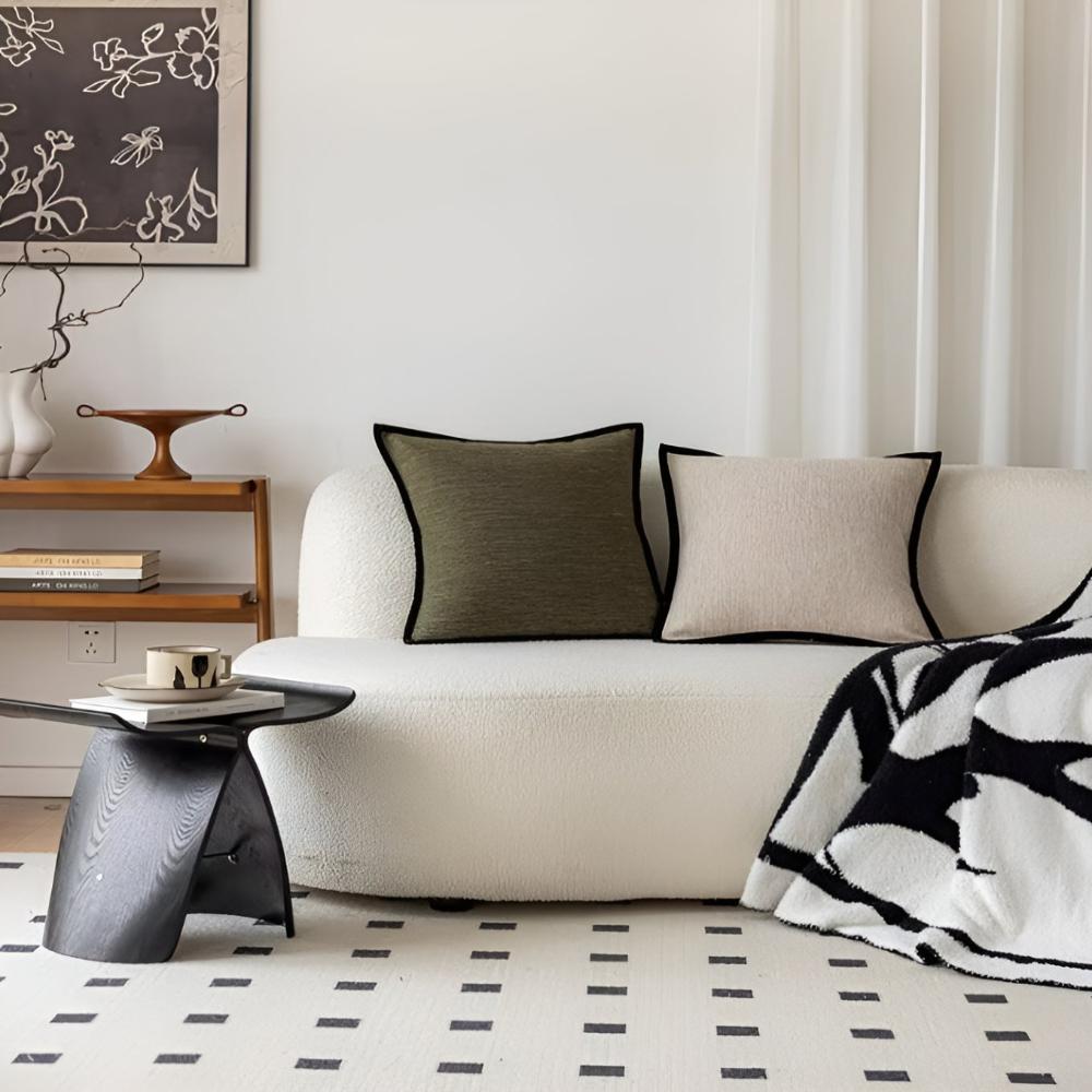 Pudebetræk i fransk vintagestil med vævet jacquardmønster på sofaen