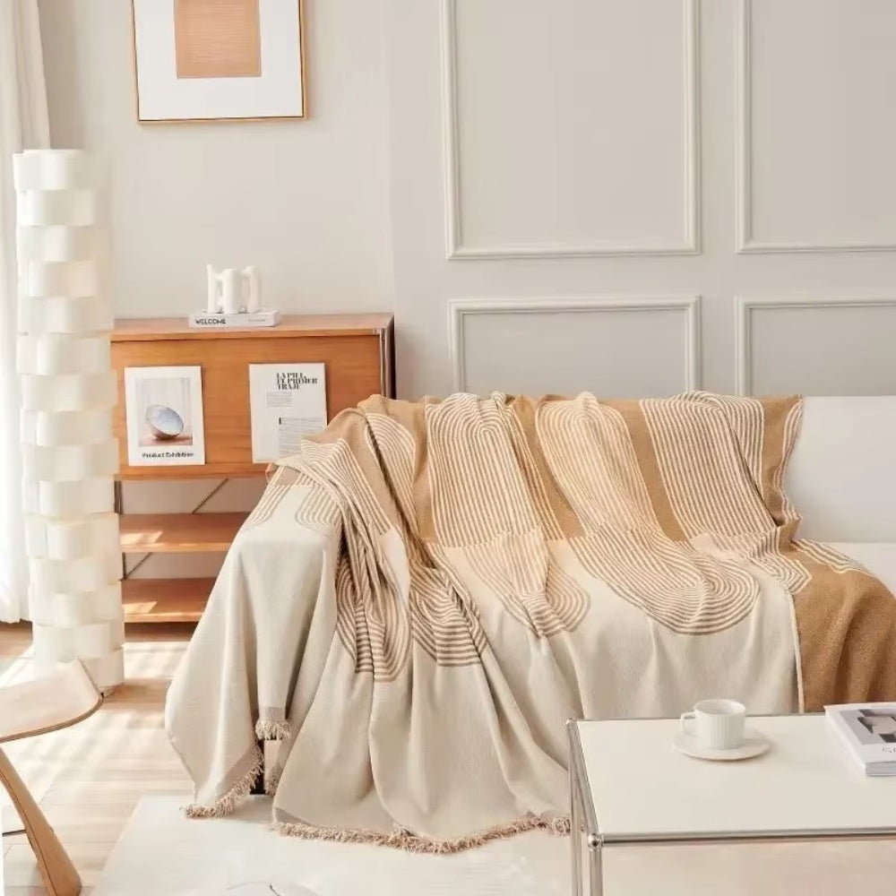 Dobbeltsidet chenille sofabetræk i boho-stil på en stue-sofa