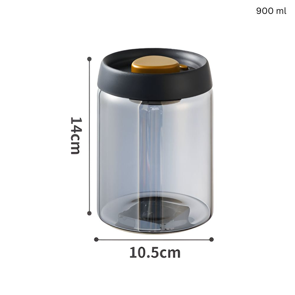 Lufttæt vakuumbeholder i klart glas med kaffebønner på køkkenbord