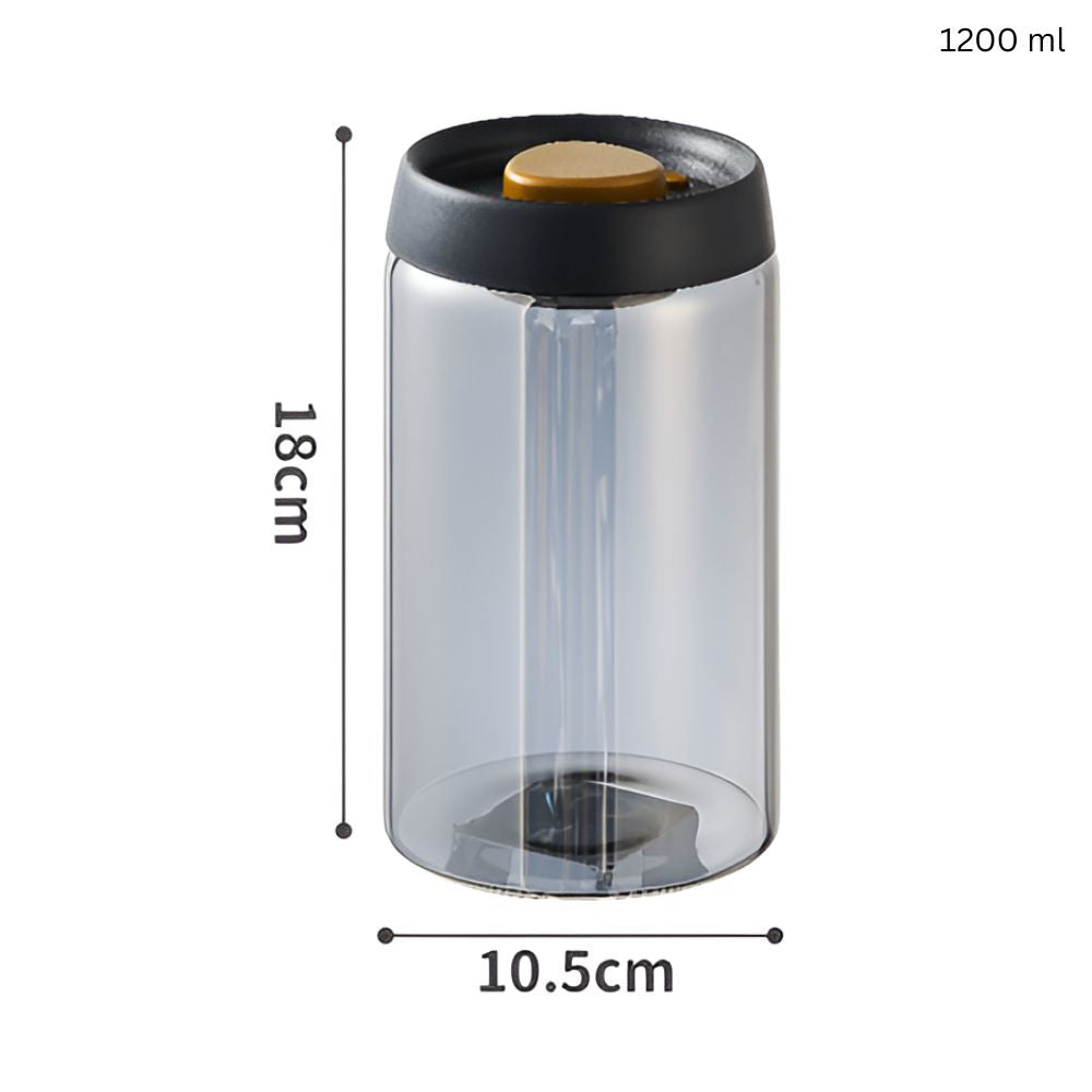 Lufttæt vakuumbeholder i klart glas med kaffebønner på køkkenbord