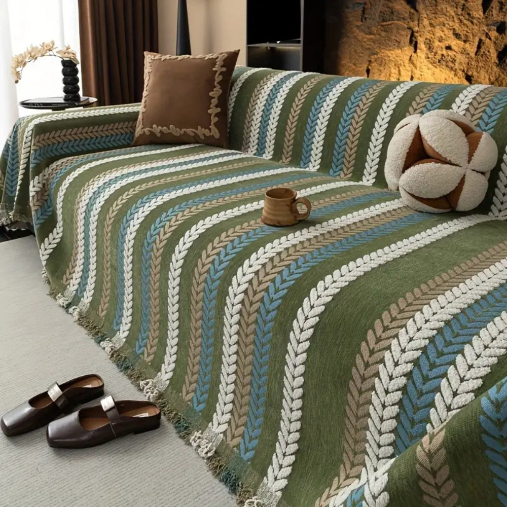Sofabetræk med striber i chenille på sofa i stuen