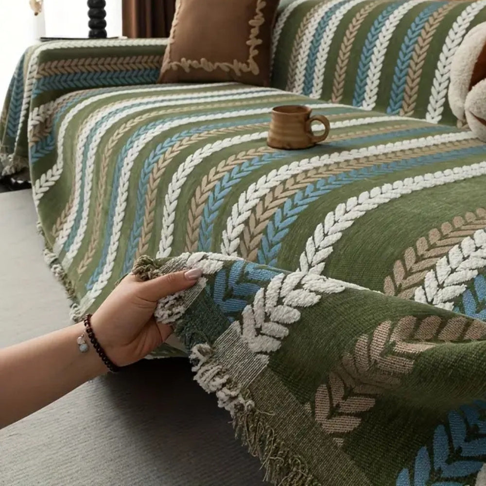 Sofabetræk med striber i chenille på sofa i stuen