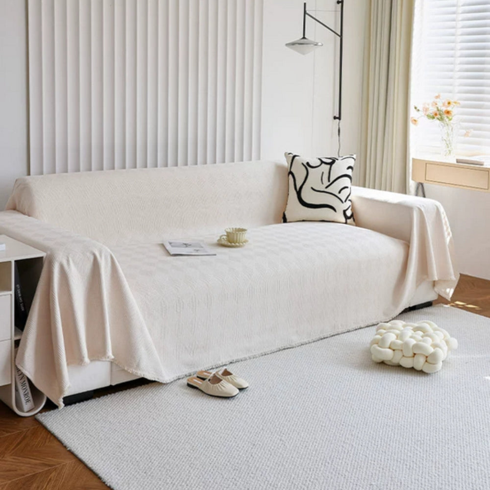 Sofabetræk i chenille med diamantmønster på sofa i stuen