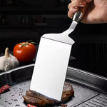 Stegespade i rustfrit stål med træhåndtag til køkken og grill
