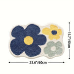 Absorberende tuftet bademåtte med blomstermønster foran badekar