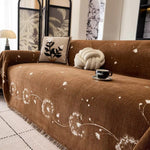 Sofabetræk med mælkebøtteprint i Japandi-stil på sofa