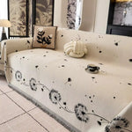 Sofabetræk med mælkebøtteprint i Japandi-stil på sofa