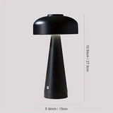 Moderne bordlampe med mat overflade og LED-lys på natbord