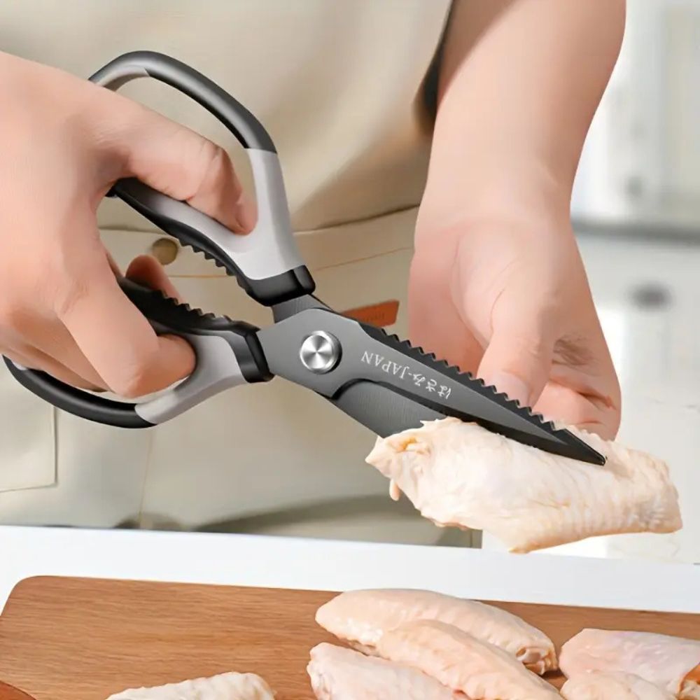 Køkkensaks i rustfrit stål med ergonomisk håndtag og flaskeåbner