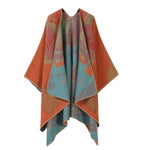 Vendbar oversize poncho i kunstig kashmir med fiskeskælsmønster