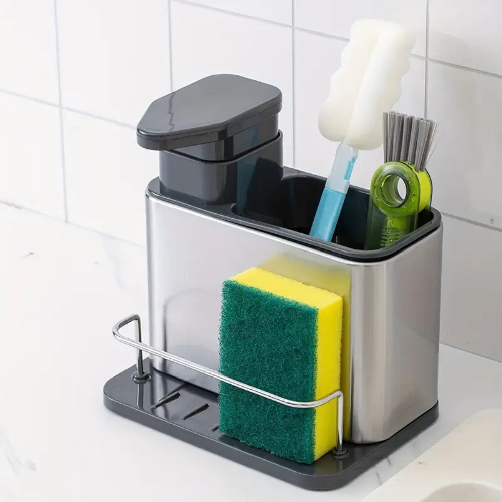 Sæbedispenser og redskabsholder i rustfrit stål ved køkkenvask