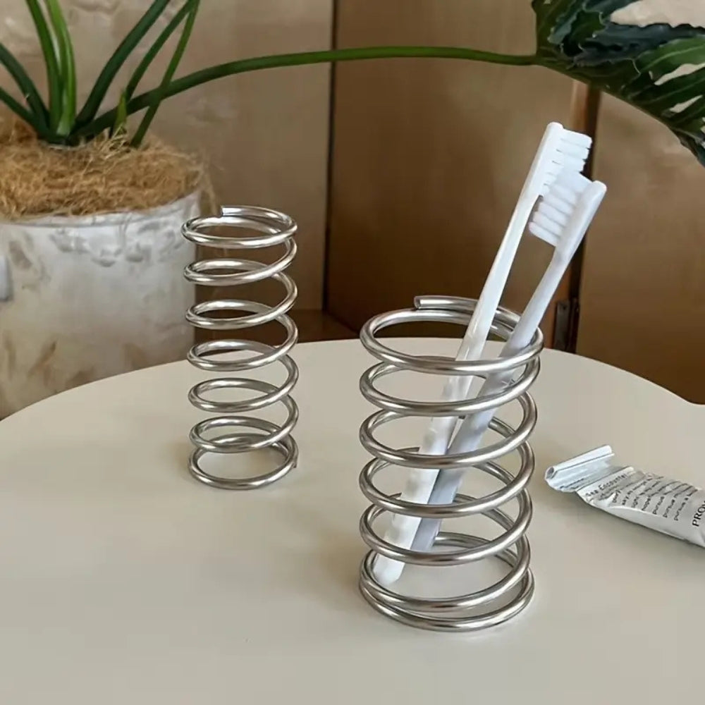 Spiralformet tandbørsteholder i rustfrit stål på badeværelset