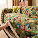 Sofabetræk i kilim-stil med geometrisk boho-mønster på sofa