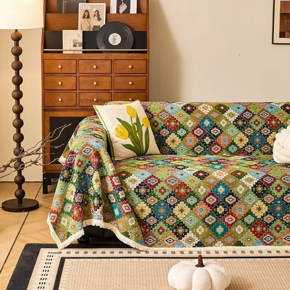 Sofabetræk i kilim-stil med geometrisk boho-mønster på sofa