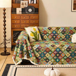 Sofabetræk i kilim-stil med geometrisk boho-mønster på sofa