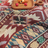 Boho sofabetræk i chenille med jacquardmønster og kvastekant på sofa
