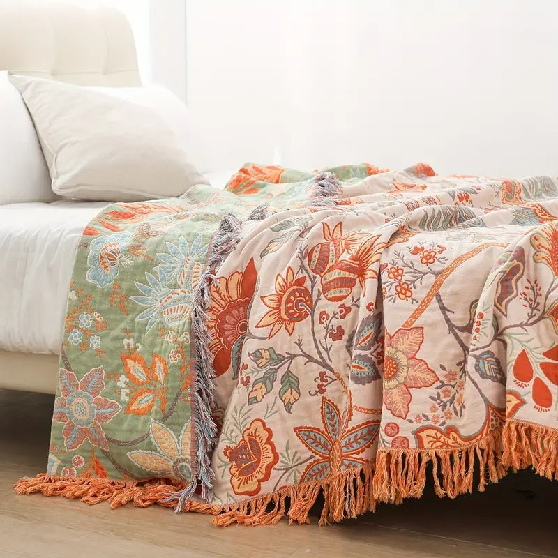 Bomuldstæppe med blomster og frynser i boho-stil